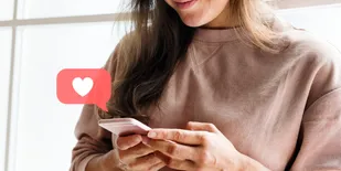 Woman using her cell phone